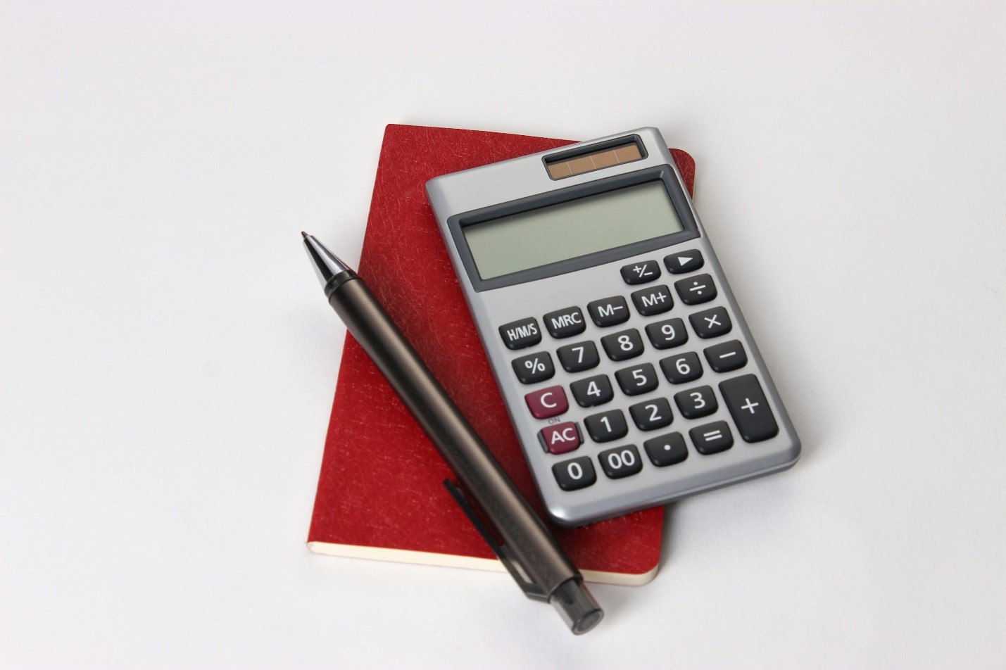 A calculator and notebook
