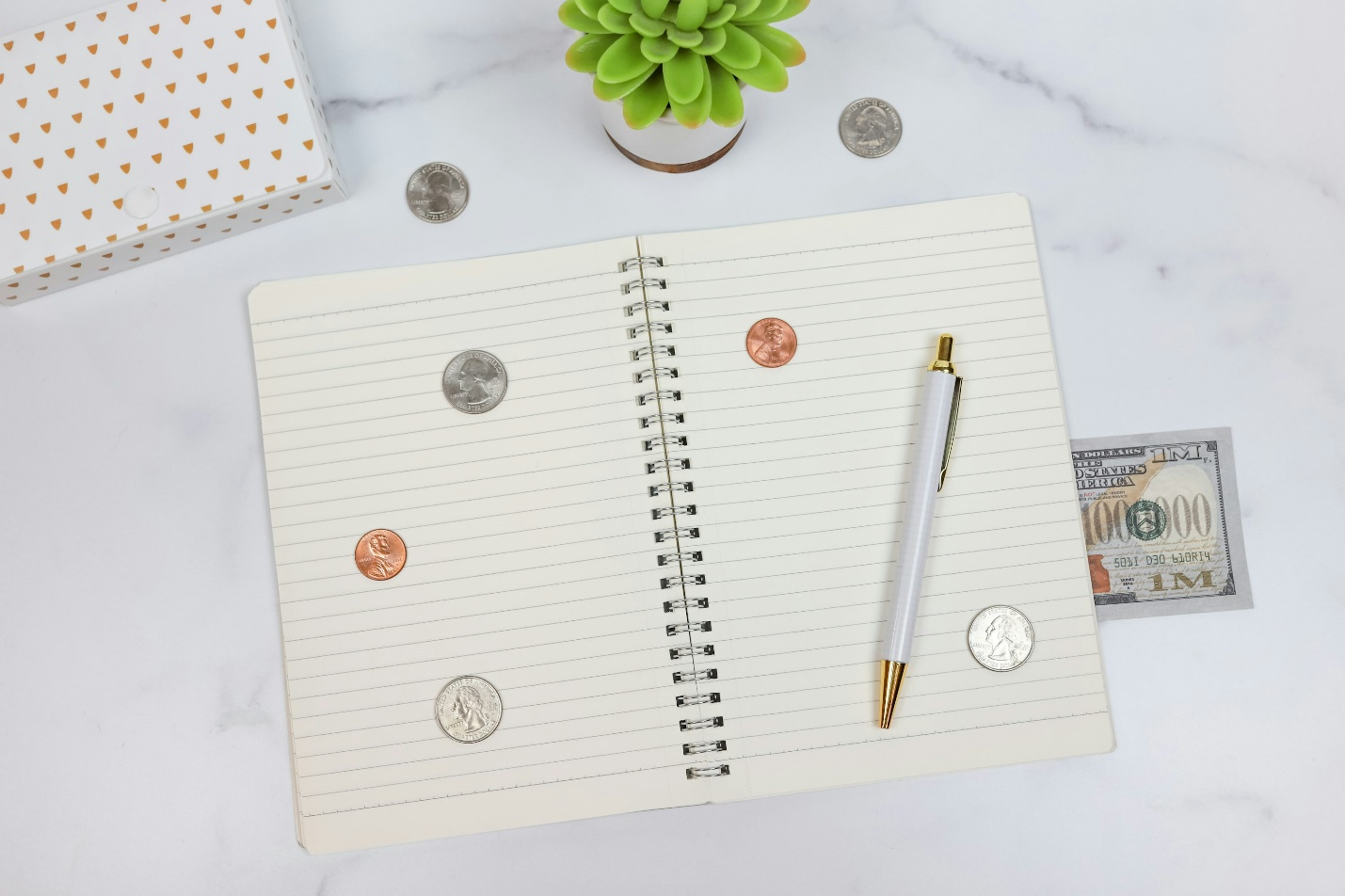 A notebook and money